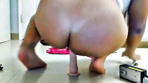 Thick Asian woman with huge ass squatting over dildo in webcam show