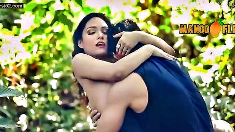 Topless South Asian beauty presses bare tits against shirtless man's back in erotic forest hug
