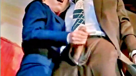 Paula Meadows in blue suit grabs exposed cock, office handjob tease