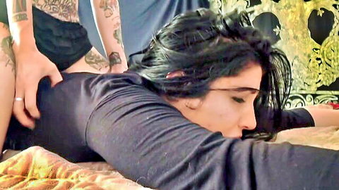 Tattooed brunette in BDSM scene, face down ass up with hand groping cheeks