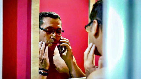 Mariska X mature stud shirtless in mirror on phone call