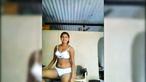 Indian aunty in white bra and panties slip show pose