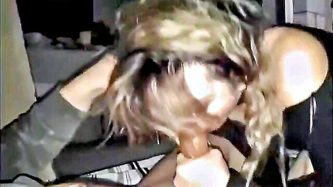 Blonde amateur giving blowjob to dildo in closeup