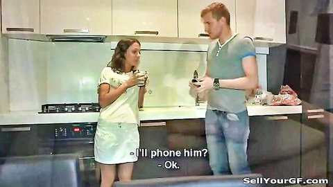 Skinny brunette teen in short skirt talks on phone with redhead stranger in kitchen before sex