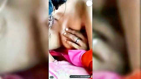 Man's hand gropes South Asian babe's bare juicy tits closeup