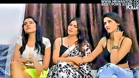 Three seductive Indian women in saree and casual outfits on couch