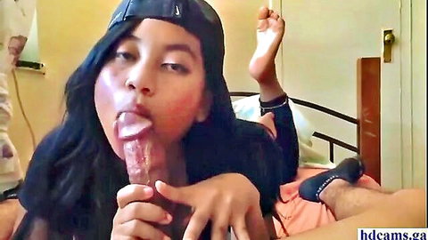 18-year-old Asian teen sucking huge dildo in seductive pose