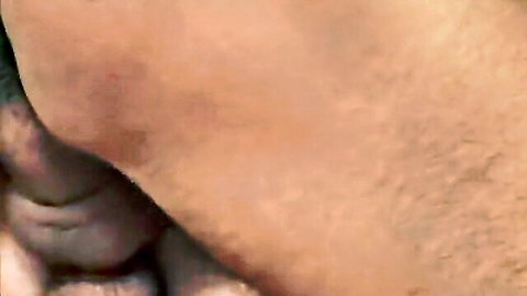 Miss Barry pulls aside red thong exposing bushy pussy closeup