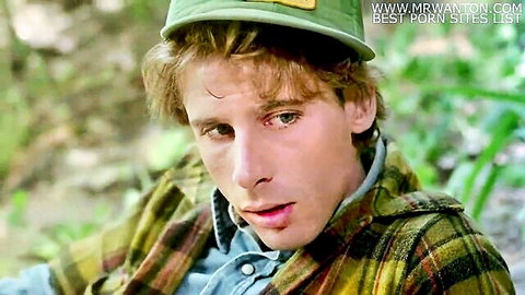 Vintage 1978 CMNM scene: handsome curly-haired guy in forest, open shirt surprise