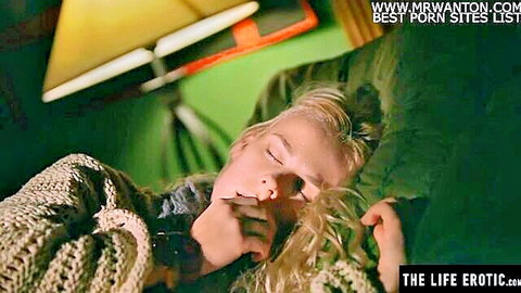 Sweaty blonde woman masturbating intensely to orgasm in bed