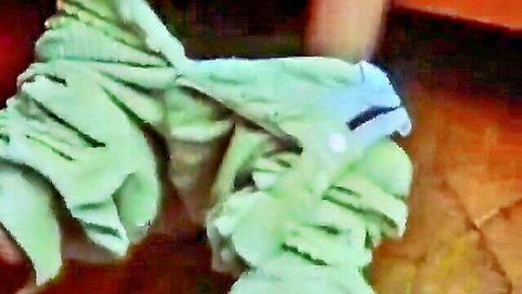 Vintage erotic clip of woman adjusting green towel wrap