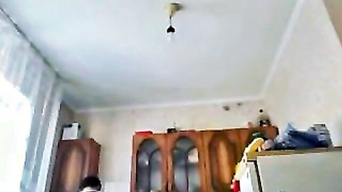 Mature woman cooking in kitchen, aged amateur xxx scene