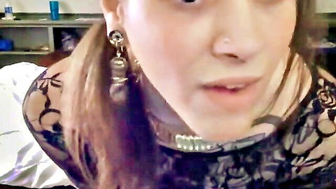 Amateur T-Girl close-up in black lace top and choker, ponytail hair
