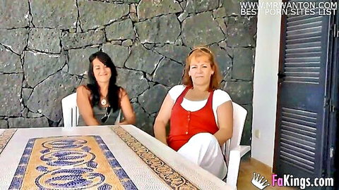Brunette and redhead women seated casually in family vacation tease, HD porn