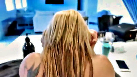 Crystina Rossi blonde with long hair nude from behind, tattooed shoulder