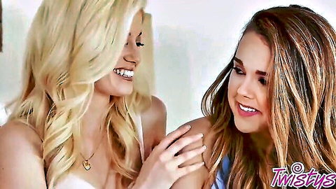 Charlotte Stokely and Dillion Harper smiling intimately, touching in Twistys lesbian tease
