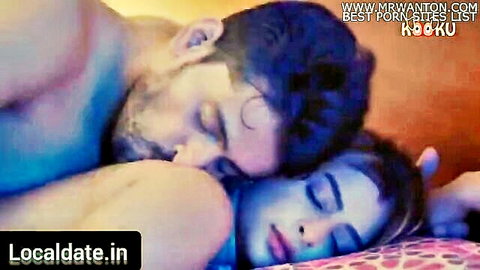 Desi woman cuddling with boss after intense sex, passionate embrace