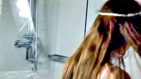 Alissa in steamy shower, wet brunette hair, teasing back view