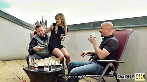 Blonde in short black dress teases bald older man and friend over drinks