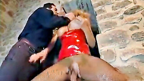 Man thrusts cock into blonde's hairy pussy against stone wall in rough outdoor fuck
