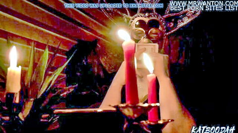 Goddess Katboodah's mystical abundance ceremony with candles and money ritual