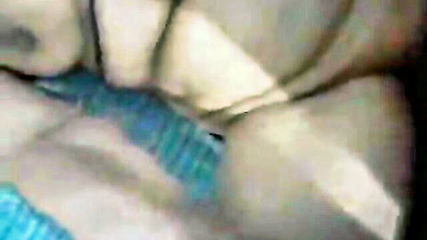 Chinese granny with saggy tits exposed in close-up explicit view