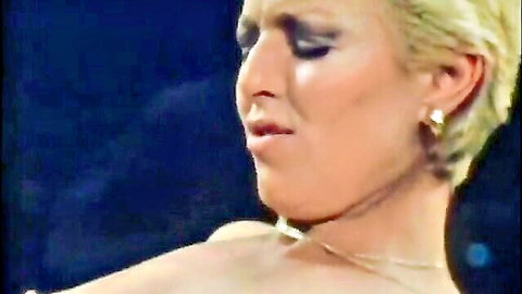 Blonde beauty in nylons moaning in ecstasy