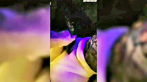 Blurry purple-lit blowjob and dildo toying scene
