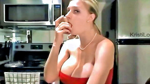 Kristi Love blonde bombshell deepthroating toy in sexy red dress