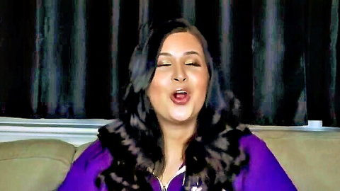 Curvy brunette Latina in purple top with moaning ecstasy face