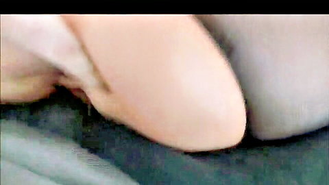 Close-up of pale-skinned woman in gray shorts during intimate afternoon suck session