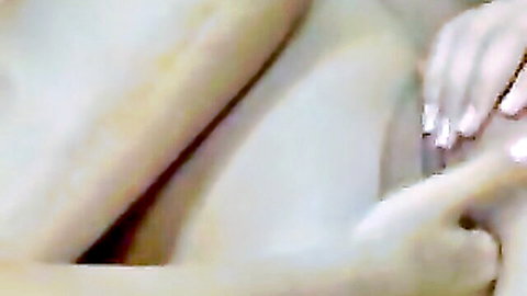 Playful girls teasing with hands on smooth pale thighs