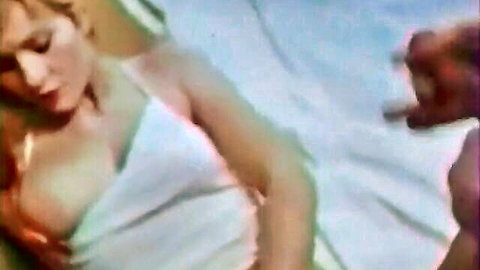 Redhead in white top slipping off shoulder, intimate close-up mutual masturbation scene