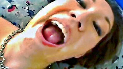 Asian woman with open mouth and tongue out, excited POV close-up ready to swallow