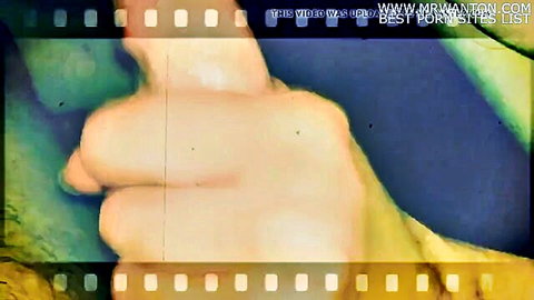 Closeup of white Caucasian hand thumbs up gesture in mranton porn sites promo filmstrip