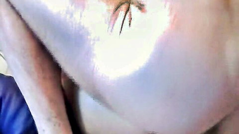 Close-up of nude German woman's side boob and armpit in amateur couple video
