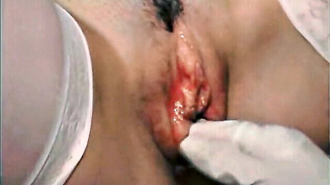 Close-up of wet pussy exam with gloved hand wiping, white bra visible, Pt. 3