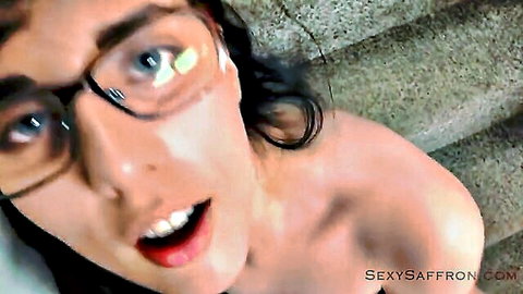 Brunette with glasses, open mouth, topless on stairs, eager expression