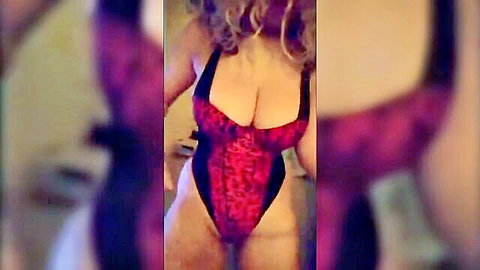 Aruba Jasmine in revealing red lingerie, busty blonde curvy pose