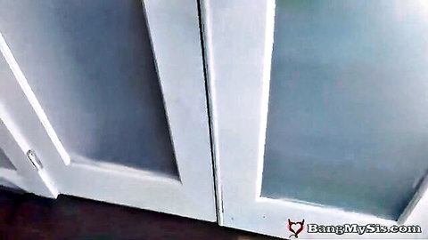 Ebony stepsis Vienna Black teases behind frosted door in raunchy scene