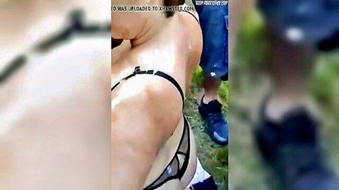Curvy woman in black lingerie bent over for sperm shower outdoor