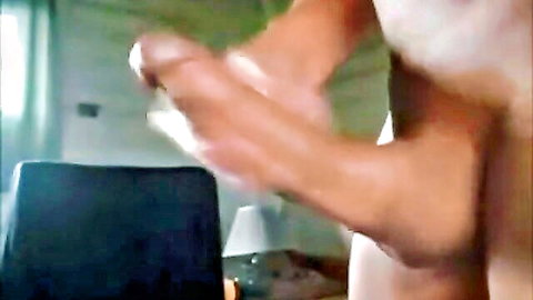Amateur guy stroking his thick hard cock with hand in solo masturbation