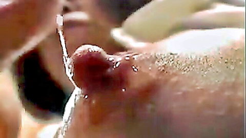 Japanese mature woman nipple sucking with cumshot closeup