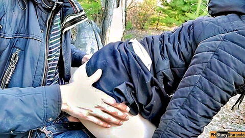 Amateur couple in forest sex, man grabs woman's exposed thigh outdoors