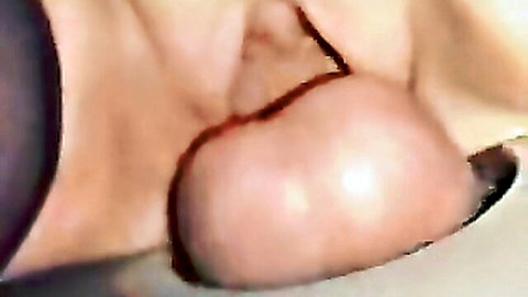 Blonde woman with cum dripping from lips after gloryhole creampie