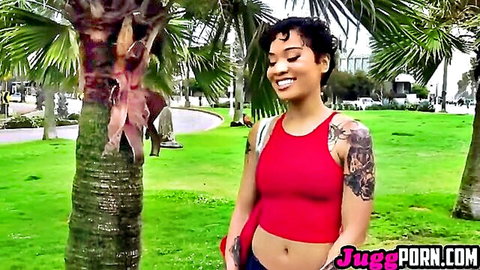 Hottie Gold smiles in red crop top and shorts, outdoor street twerk tease