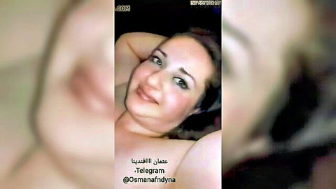 Arab woman Osmandyna topless selfie, smiling seductively