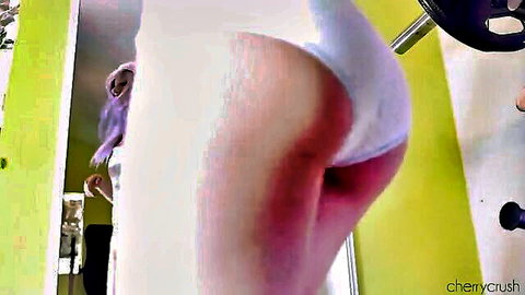Curvy blonde bending over in tight white panties, big ass focus