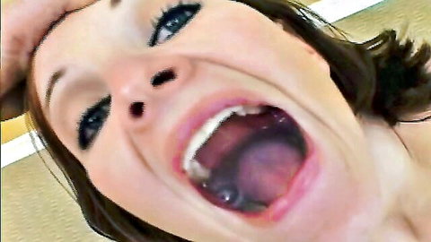 Brunette woman mouth wide open swallowing cum in intense POV oral