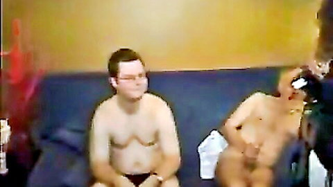 Two shirtless men in underwear lounging in amateur Vienna swinger video